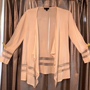 White cardigan with opaque stripes on bottom half